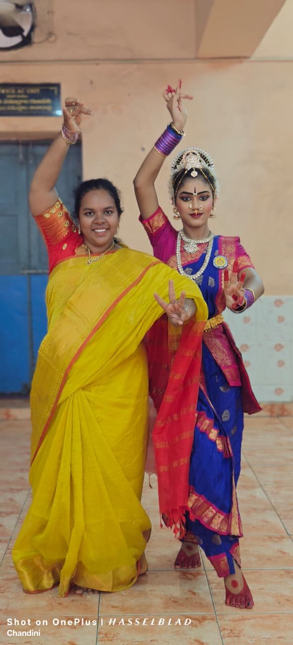 Guru L. Indrani Narendra Reddy guiding student in classical Kuchipudi posture and mudras