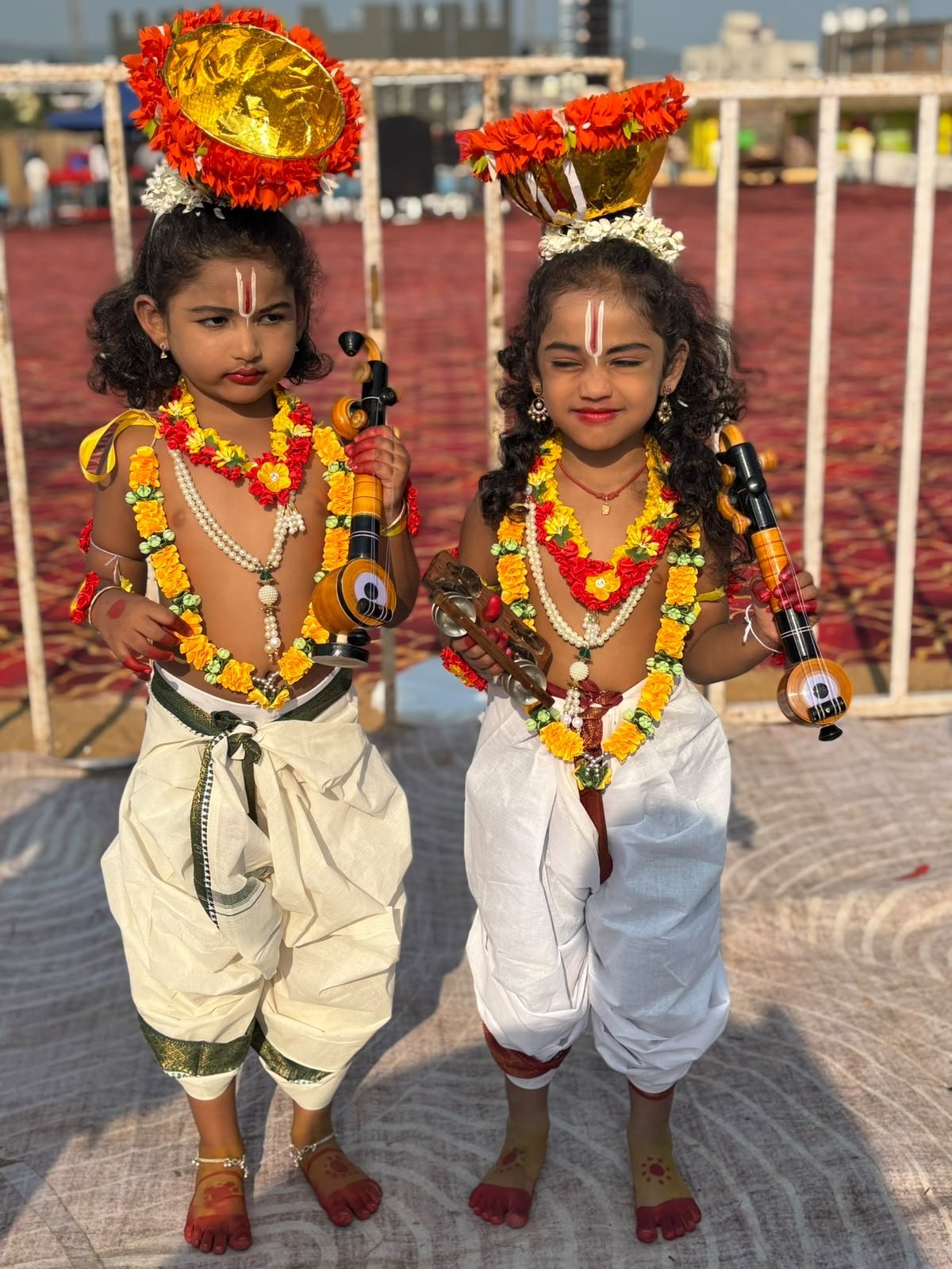 Young students representing classical rhythm and music with tanpura and cymbals